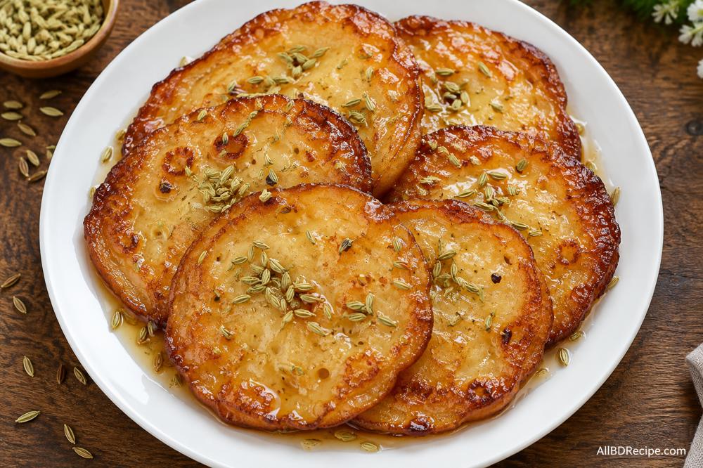 মালপোয়া: মৌরির গন্ধে রসে ভেজানো মিষ্টি